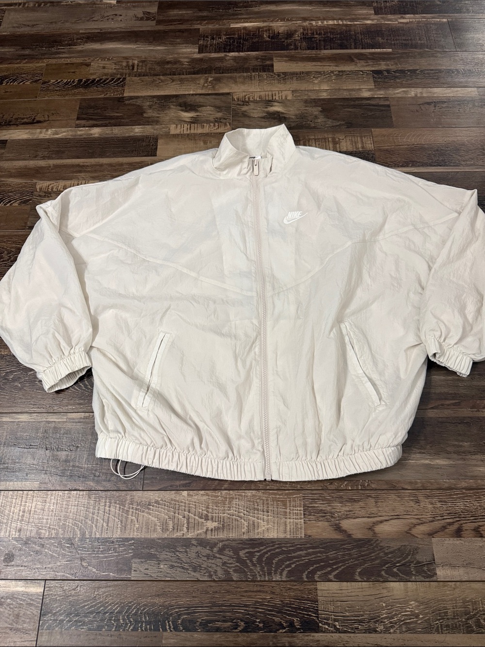 Nike Women's Light Cream Full-Zip Windbreaker Jacket